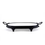 Oval serving tray with a matte black iron base