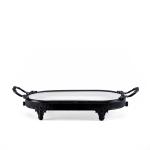 Oval serving tray with a matte black iron base